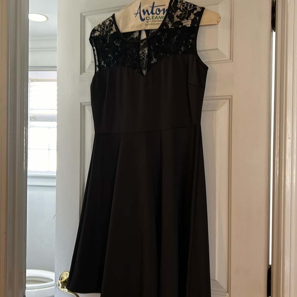 Gorgeous black cocktail dress with lace detailing